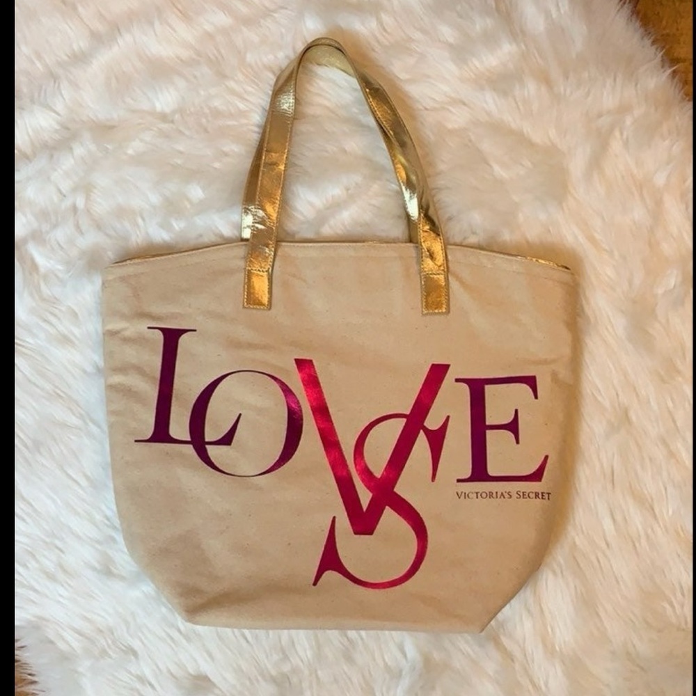 Victoria’s Secret roomy canvas tote with LOVE spell out and gold handles
